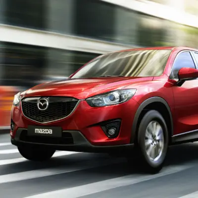 CX-5_2011_zealred_action_02_highres